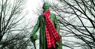 Statue of Ezra Cornell, university founder, with a red scarf