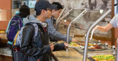 Students in line at one of the campus dining facilities