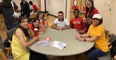 Prepare students playing cards together 