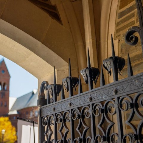 Barnes Hall as seen through the gates of Willard Straight Hall