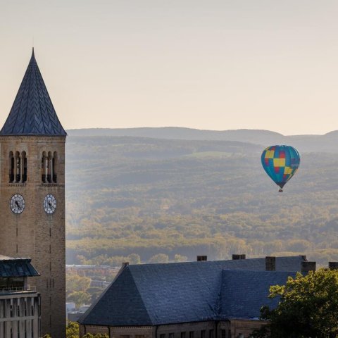 Cornell tower with hot air balloon in background